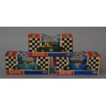 3 x Scalextric cars.