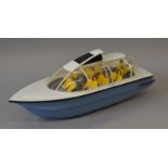 A large unboxed plastic model boat, approximately 64cm in length, complete with passengers.