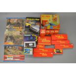 A mixed lot of boxed Tri-ang OO Railway and Scalextrix items along with some other toys - 12