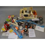 Good quantity of model aeroplane parts, materials, starters,transmitter unit. Etc.