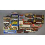 A mixed lot of boxed diecast model vehicles by Bburago, Revell, Onyx, EFE, Matchbox,