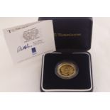 A Westminster cased Guernsey £25 gold proof coin, 24 carat 1/4oz dated 2000,