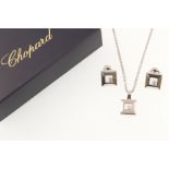 An 18ct white gold CHOPARD Happy Diamonds collection earring,