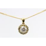 A diamond cluster pendant, the centre stone approx 0.75ct, on an 18ct H/M chain.