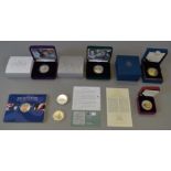 Seven 925/999 Silver proof coins including three Royal Mint crowns, 1oz Britannia,