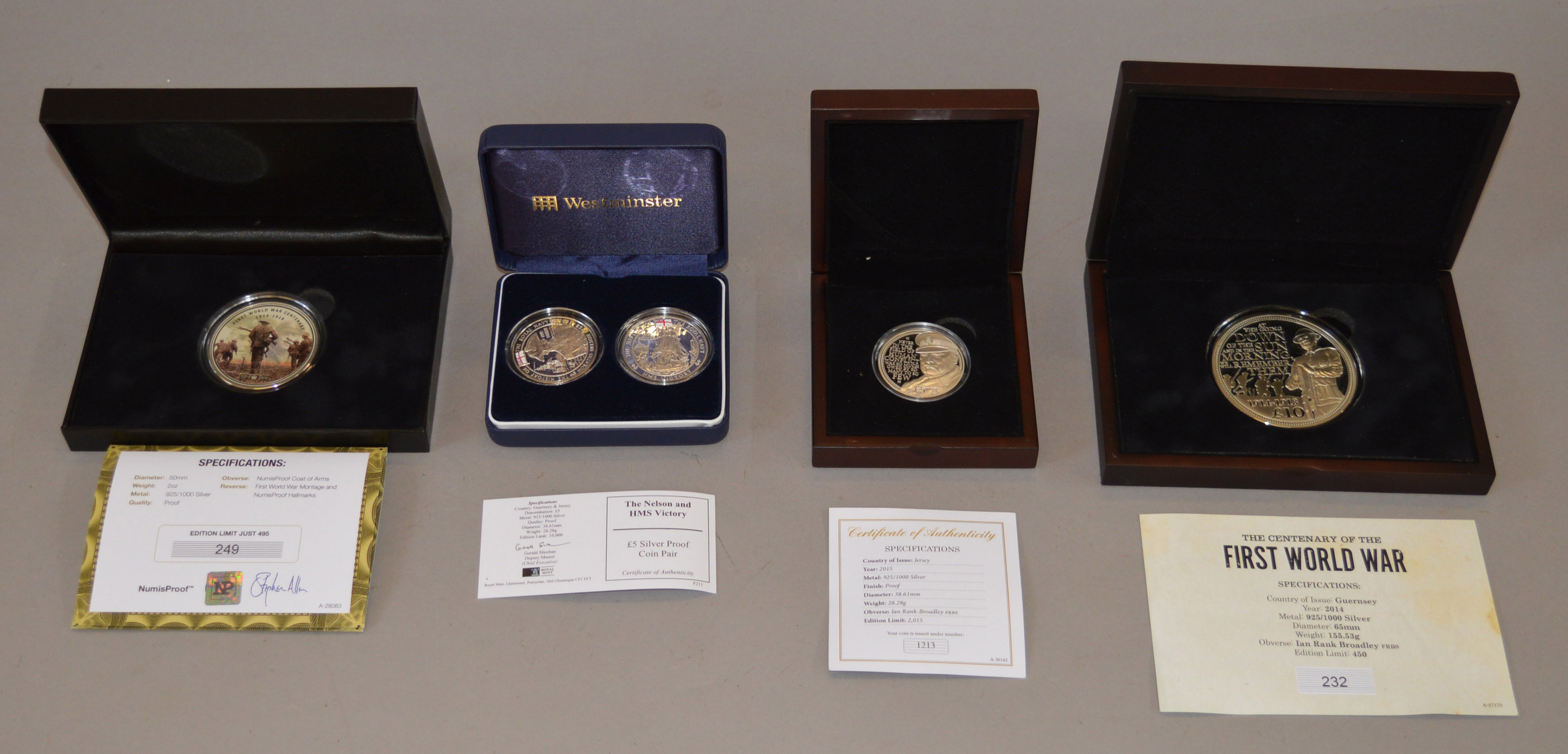 A 925/Silver 5oz proof medallion & three other silver cased proof coin/medallions,