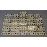 Twenty six cards containing silver & bronze coins of Great Britain dated 1911 to 1936 (half-crown