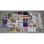 A quantity of coins to include Royal Mint proof sets, £5 coins (some in covers),