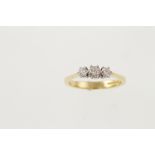 A modern 18ct H/M three stone diamond ring totalling approx 0.55ct, approx 4.