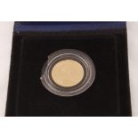 A Royal Mint cased proof sovereign dated 1979,