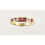 A ruby and diamond half eternity ring stamped 18ct, size M, approx weight 3.