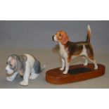 A Beswick Connoisseur Beagle figure together with a Lladro dog figure (2)