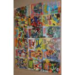 A collection of vintage Marvel, DC and other comics.