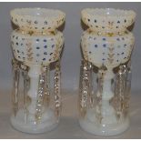 A pair of blown white opaque glass lustres with gold and blue gilt design, 9 crystal drops each.