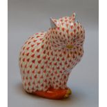 A Herend Hungary cat figure in red fishnet. Height 11cm.