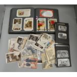 An interesting Edwardian Postcard album and WW1 era postcards including Asian and North African
