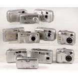 11 Compact Digital Cameras. 11 compact digital cameras, various makes inc Olympus, Kodak, Nikon etc.