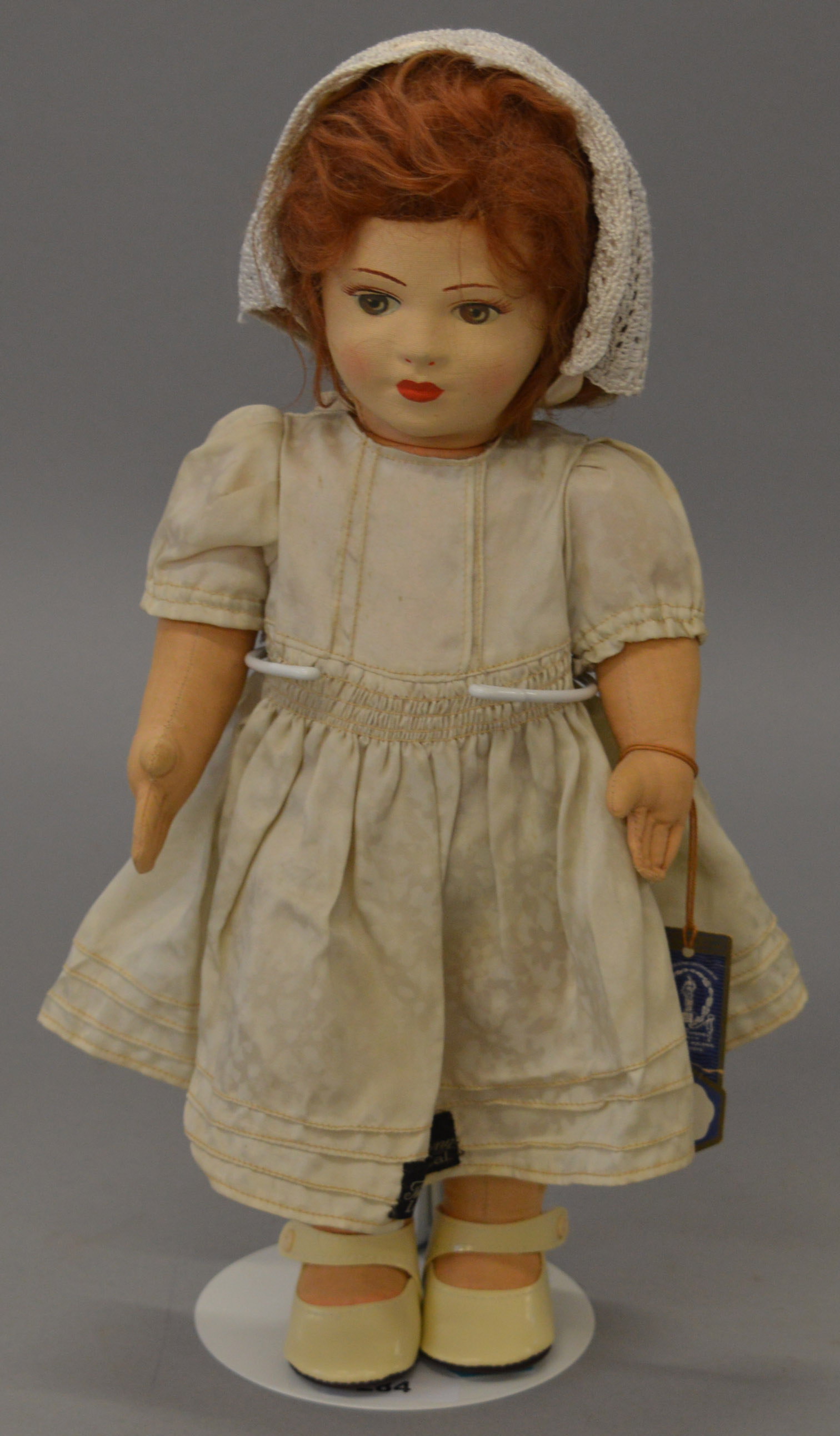 A 14 inch Chad Valley Girl Doll with stockinette face.
