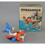 A boxed Waco Japanese tinplate and plastic battery operated Bombardier Prop Fighter Plane,
