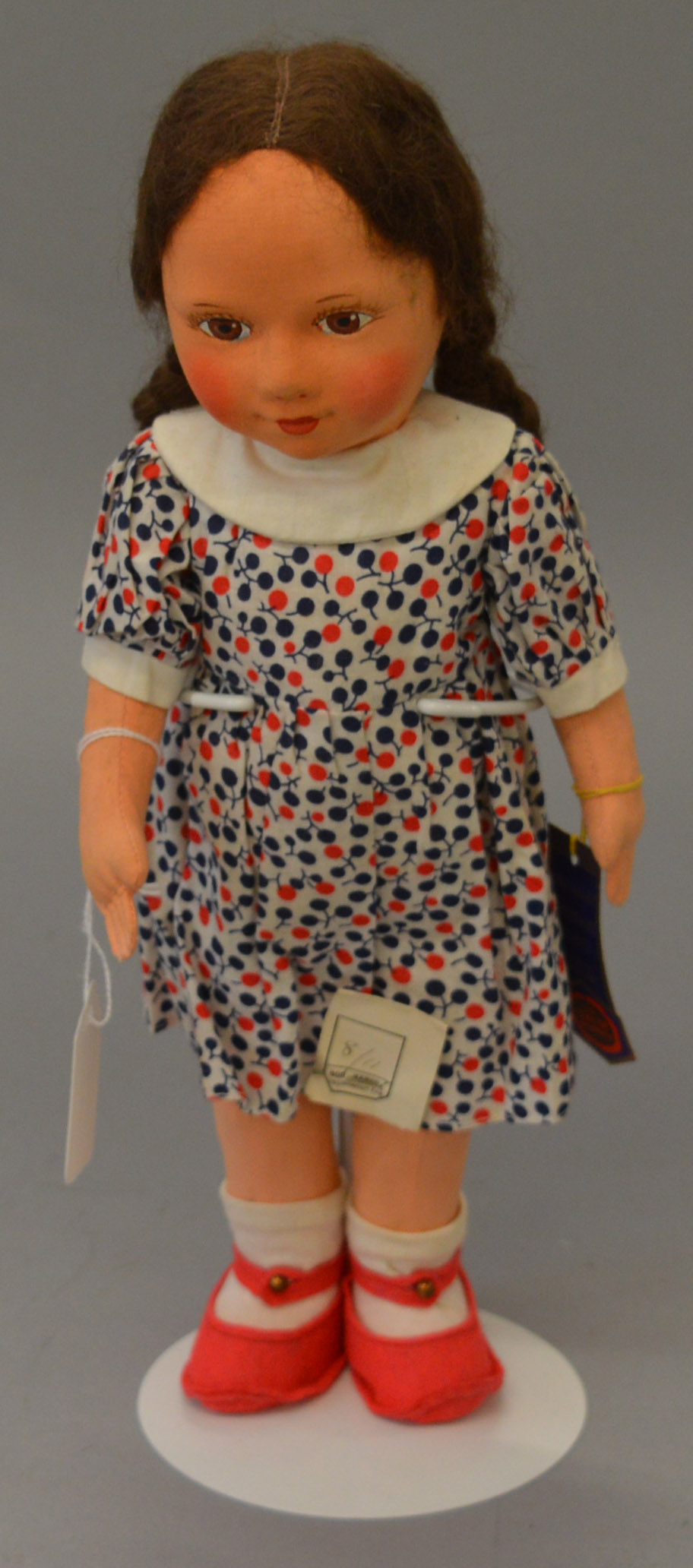 14" Chad Valley girl doll in original clothing with hang tag and original shop price label attached