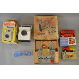 A mixed group of plastic toys including a boxed Merit 'Dan Dare' Electronic Radio Station appears F