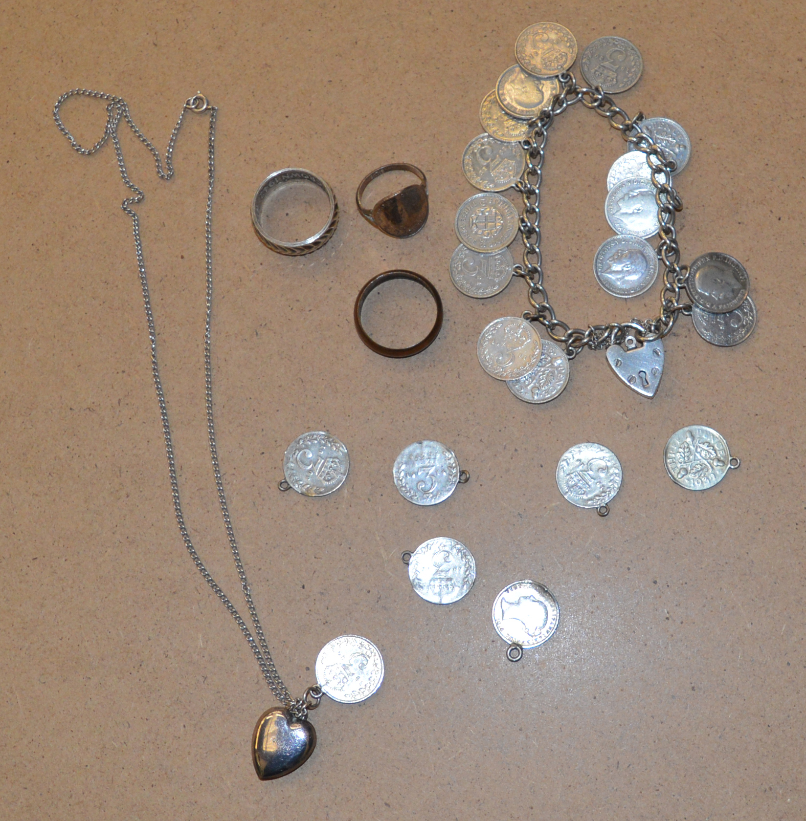 A small lot of silver including a 3d bracelet & ring set together with a 1942 Half-Crown ring,