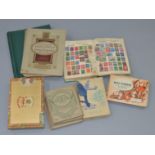 22 Cigarette card albums and loose stamps etc.