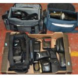 A mixed lot of cameras with two carry cases