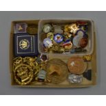 A mixed lot of collectables including badges, medallions,