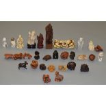 Approx 30 resin and wooden netsukes and similar.