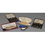 A mixed lot of collectables including two hallmarked silver boxed spoon sets and pair of sugar