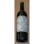 Alcohol: A bottle of 1983 Chateau Pinchon Longueville, Comtesse de Lalande.