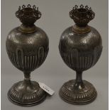 A pair of early 20th century Walker & Hall lamp bases, baluster form on a pedestal foot,