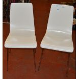 2 modern dining room chairs.