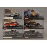 6 x Carrera cars. McLaren Mercedes MP4/17 Driver No 3. Ferrari F2002 V10 No1.