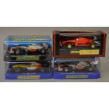 4 x Scalextric cars. C2046 Ferrari 643 No2. C3265 Vodafone McLaren Mercedes.