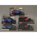 5 x Carrera Cars. 2x Toro Rosso STR-1, 2007 livery, driver numbers 18 and 19.