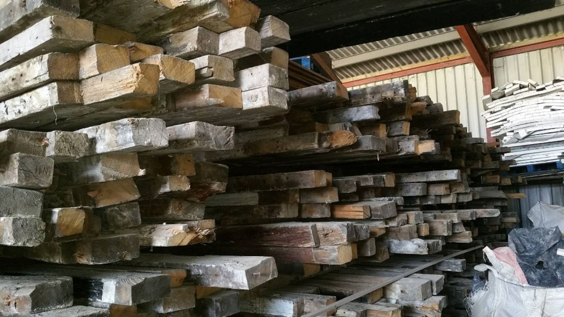 200 year old approx joist timbers taken from a warehouse in clink street, london.