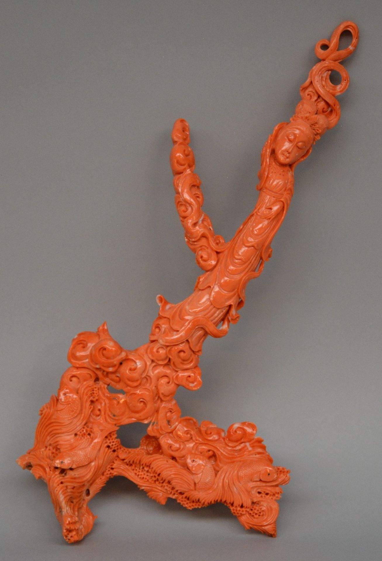 A Chinese red coral sculpture depicting a court lady and some fish, H 33 cm, Weight: about 411 g