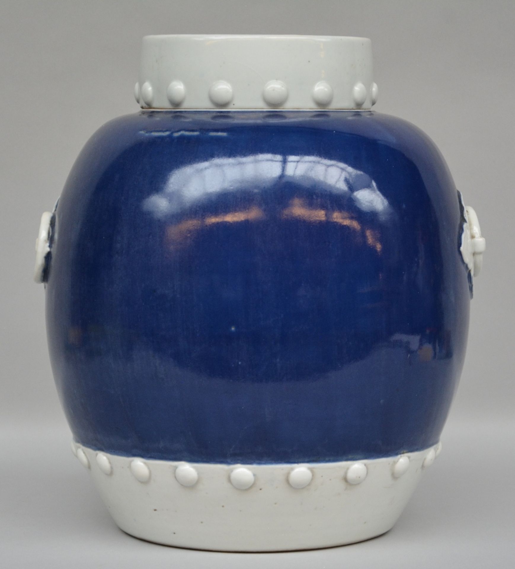 A Chinese blue and white jar with cover, decorated with relief, 19thC, H 41 cm (minimal chips on the - Bild 3 aus 8
