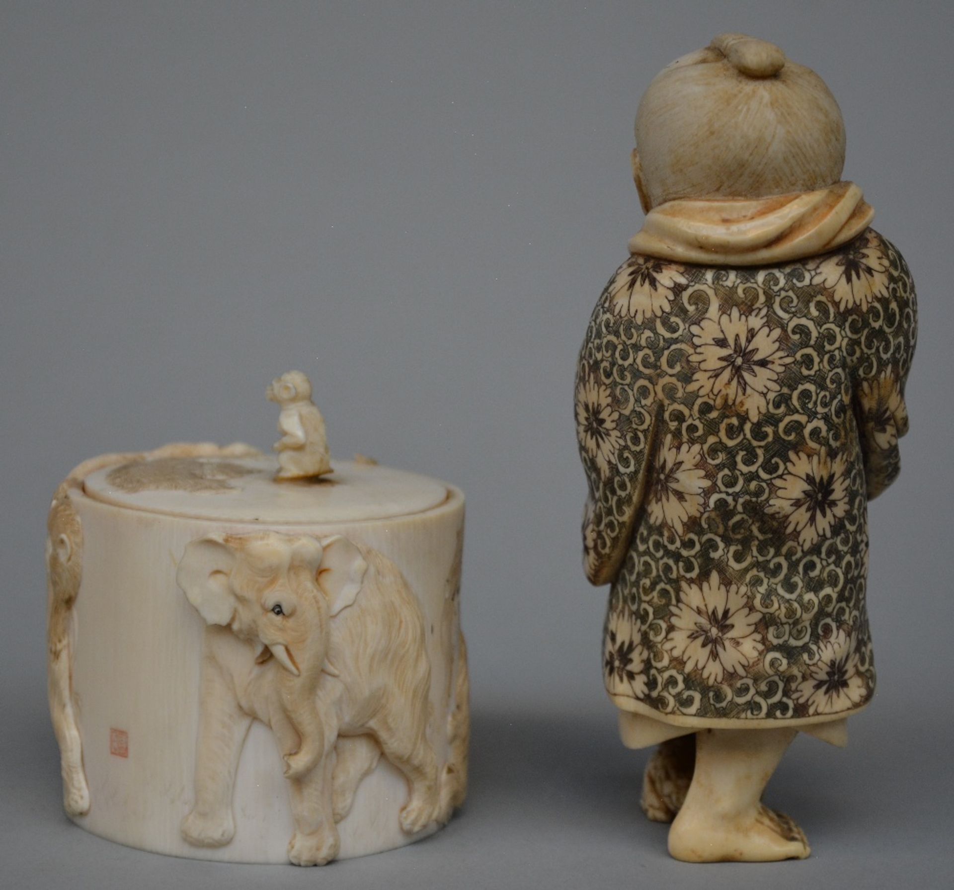 A Japanese ivory okimono of a man holding a lantern and stepping on a toad, scrimshaw decorated, - Image 3 of 7