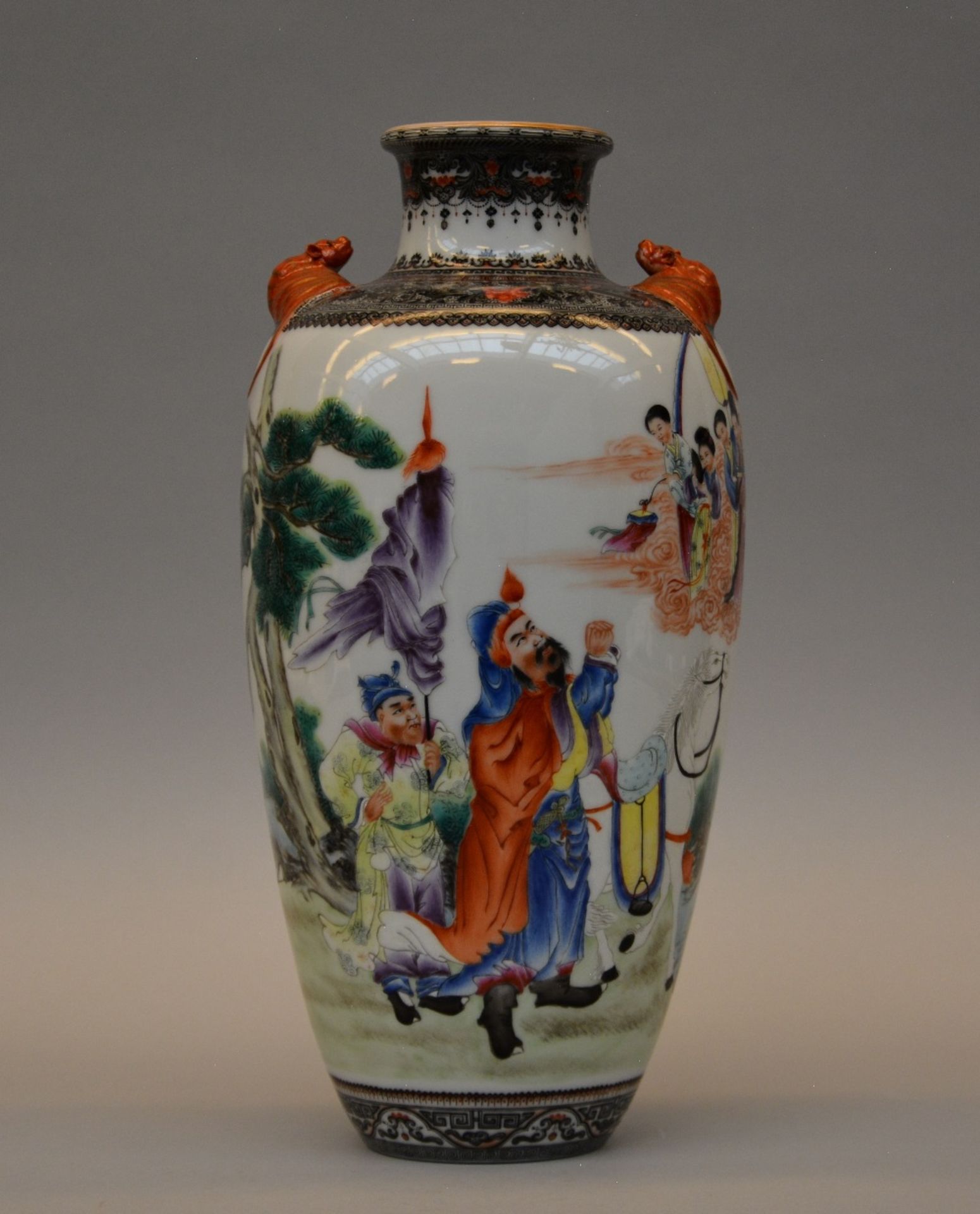 An exceptional Chinese polychrome decorated vase, painted with genre scene, relief decorated with