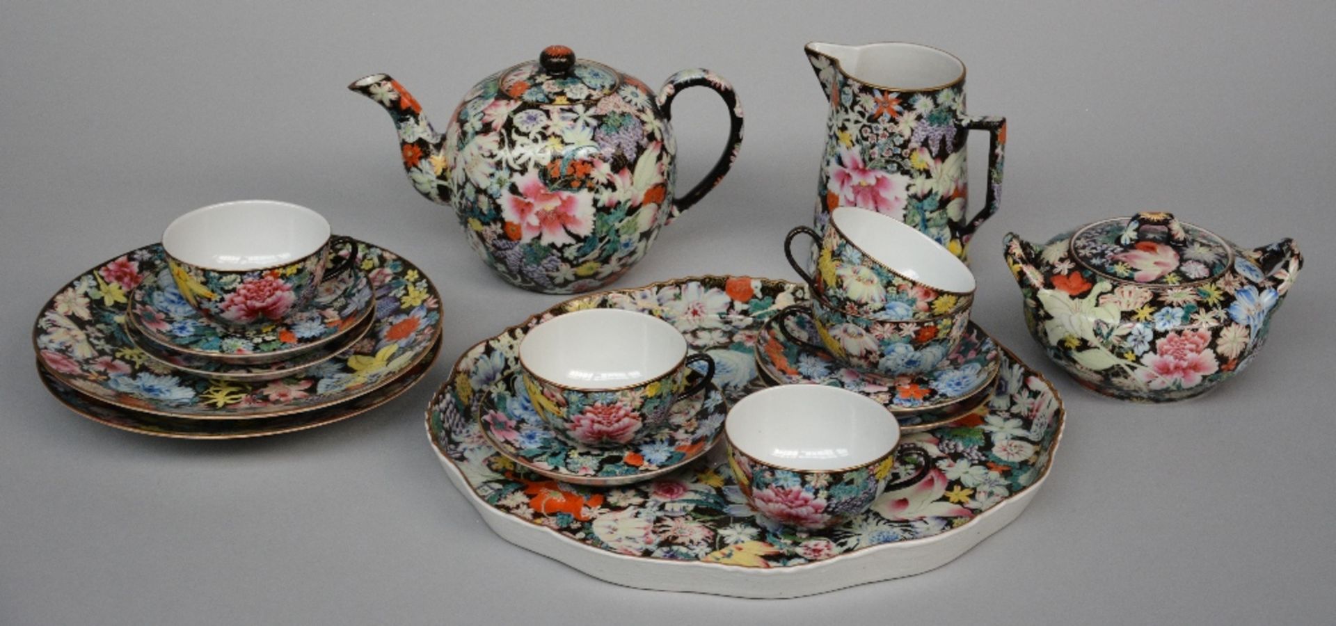 Part of a Chinese tea set with mille-fleurs decoration, marked, first half of 20thC, H 5,5 - 15 -