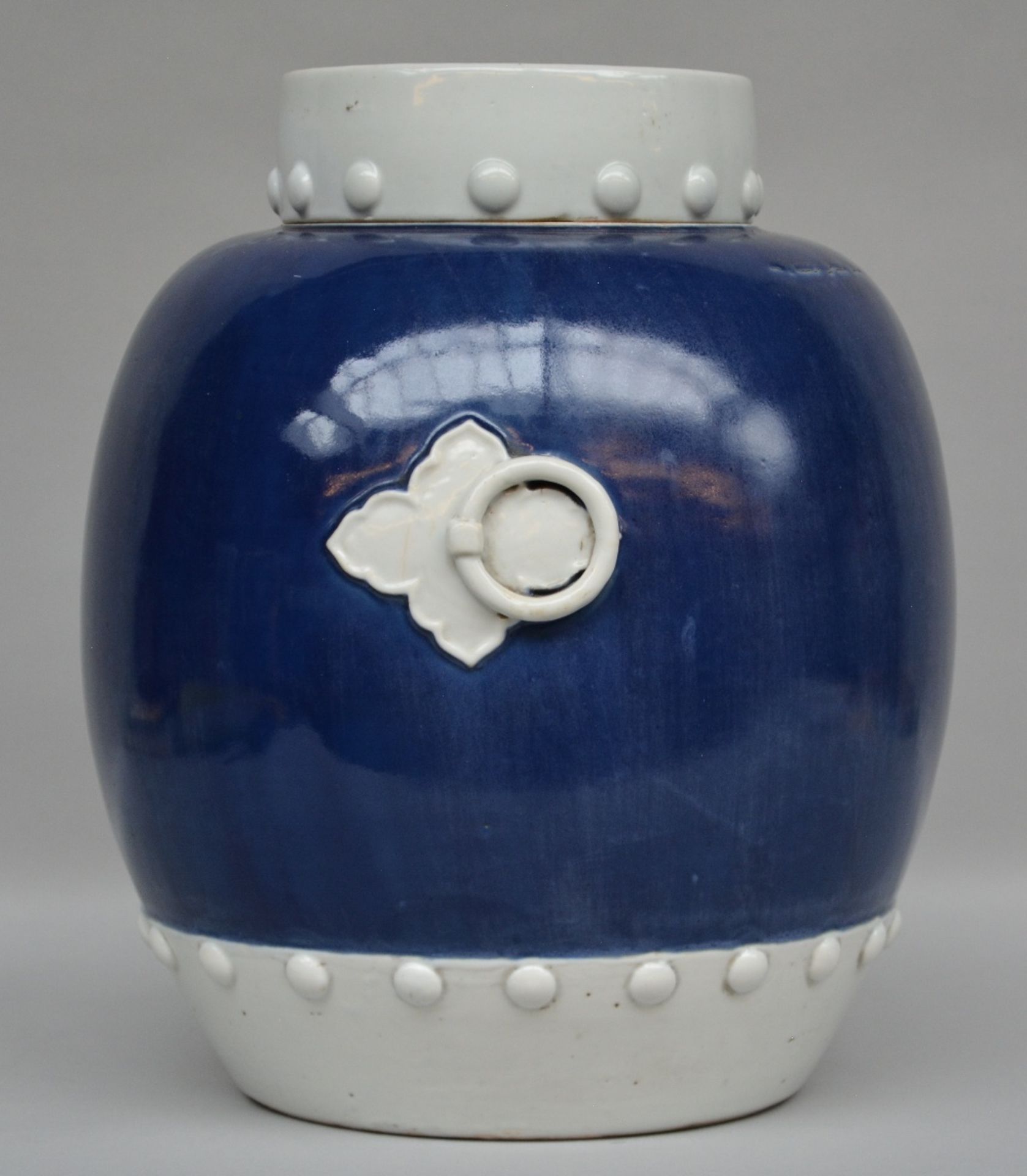 A Chinese blue and white jar with cover, decorated with relief, 19thC, H 41 cm (minimal chips on the - Bild 2 aus 8