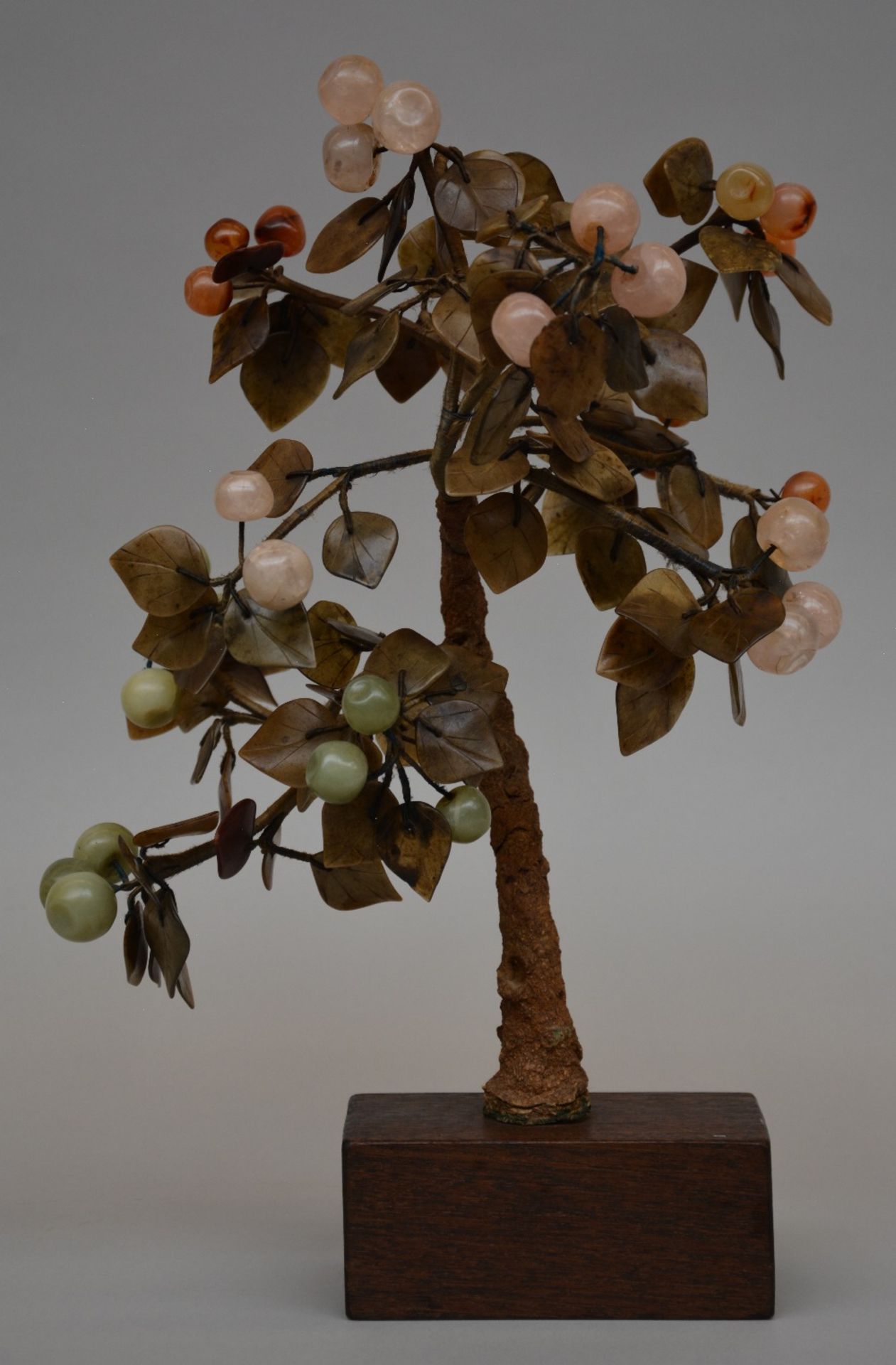An Oriental tree, decorated with gemstones, H 43 cm