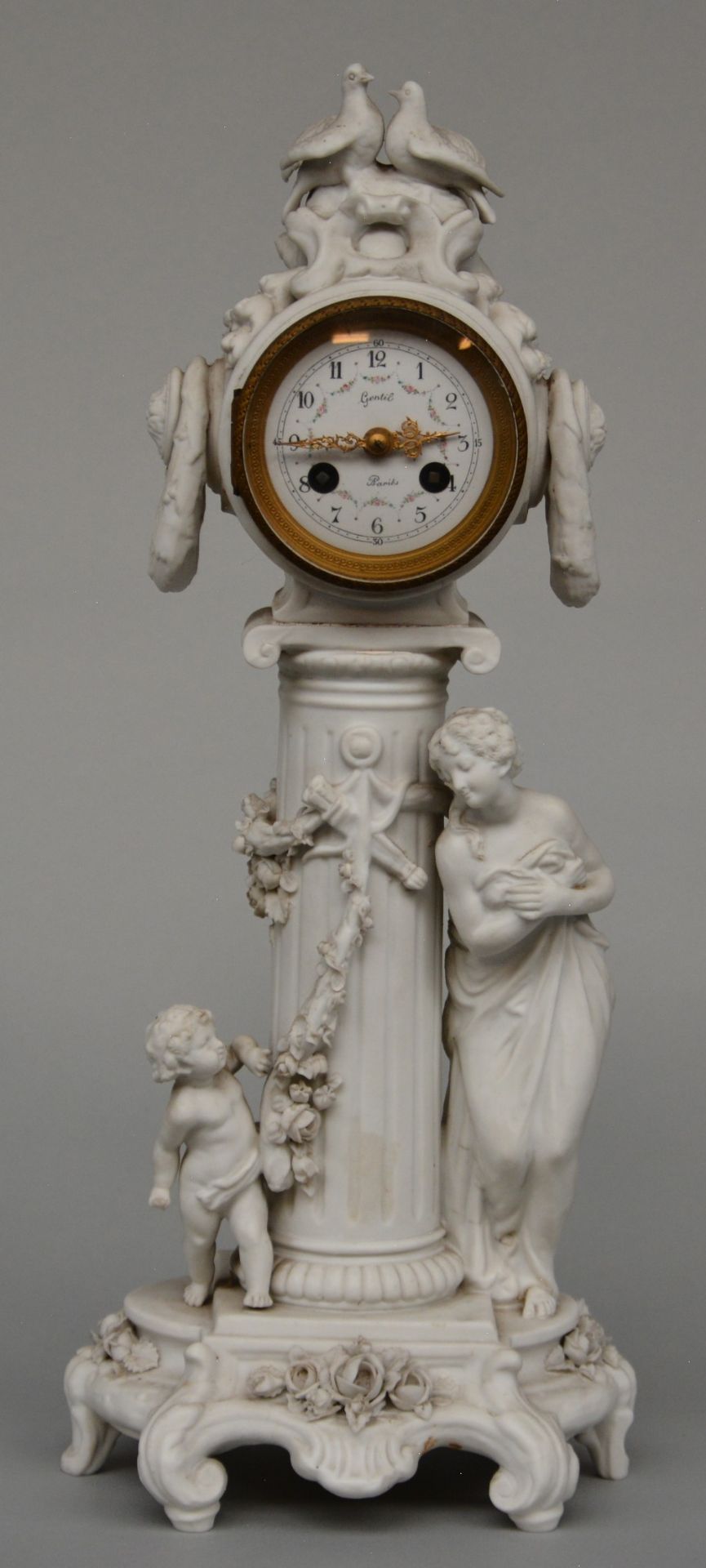 A late 19thC romantic biscuit clock, clock face marked Gentil ¨¤ Paris, H 45,5 cm (minor damage)