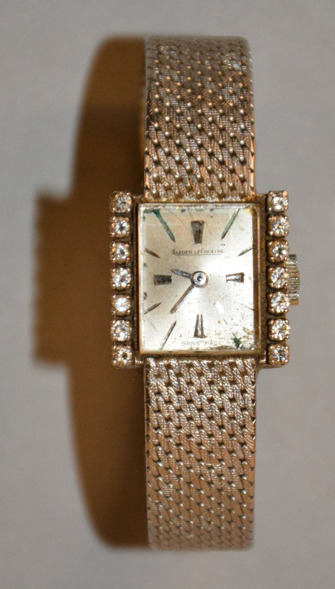 A Jaeger-Lecoultre women's wrist watch in 18ct gold, mounted with brilliant-cut diamonds, Total