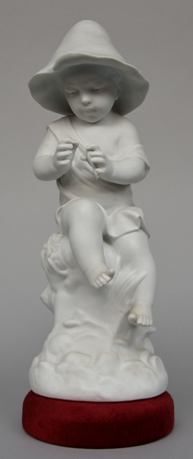 Leconney, a biscuit figure of a young child, H 39,5 cm
