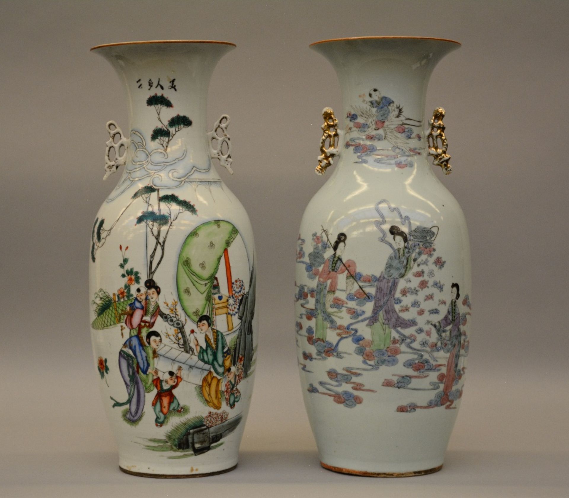 Two Chinese polychrome decorated vases, painted with genre scenes, H 58 cm