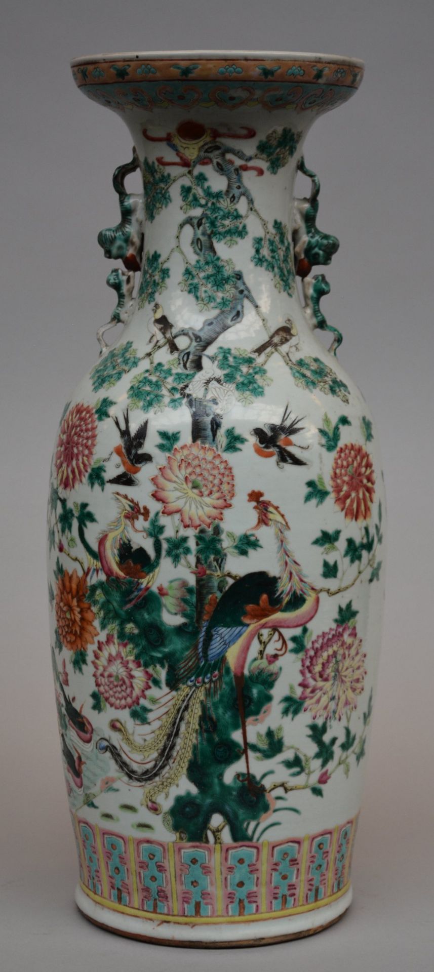A Chinese polychrome vase, decorated with birds and flowers, 19thC, H 60,5 cm (damage on the